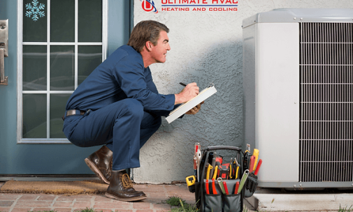 An Ultimate HVAC technican working on an outdoor AC unit